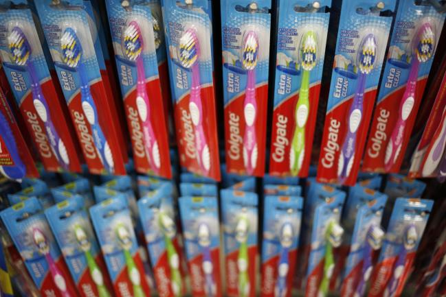 © Bloomberg. Colgate-Palmolive Co. toothbrushes hang on display for sale at a Dollar Tree Inc. store in Louisville, Kentucky, U.S., on Friday, Aug. 24, 2018. Dollar Tree Inc. is scheduled to release earnings figures on August 30. Photographer: Luke Sharrett/Bloomberg