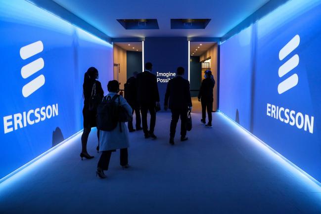 &copy Bloomberg. Projected logos on the wall of a room at the Ericsson AB stand on day two of the MWC Barcelona at the Fira de Barcelona venue in Barcelona, Spain, on Tuesday, March 1, 2022. Over 1,800 exhibitors and attendees from 183 countries will attend the annual event, which runs from Feb. 28 to March 3. Photographer: Angel Garcia/Bloomberg