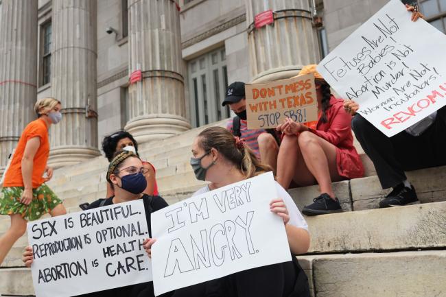 © Bloomberg. A reproductive rights rally at Brooklyn Borough Hall in New York City on Sept. 1.