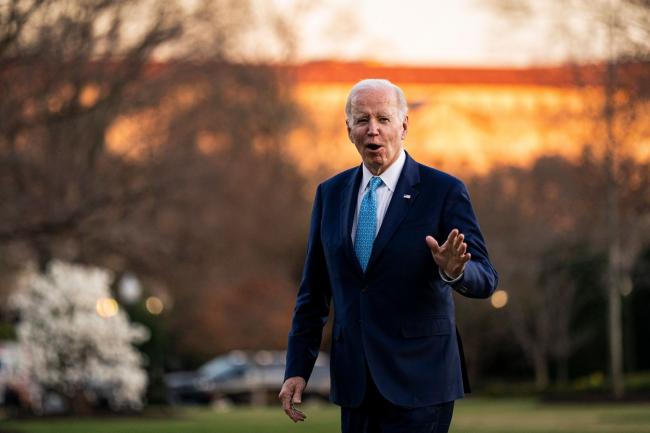 &copy Bloomberg. US President Joe Biden walks on the South Lawn of the White House after arriving on Marine One in Washington, DC, US, on Tuesday, Feb. 28, 2023. Biden discussed his plan to protect Americans' access to affordable health care in Virginia Beach.