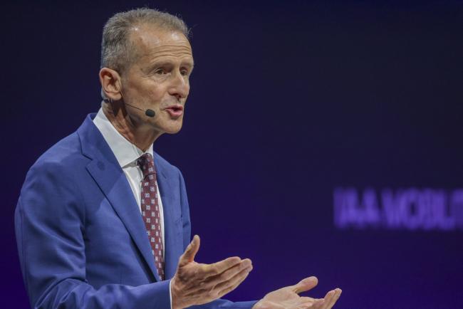 © Bloomberg. Herbert Diess, chief executive officer of Volkswagen AG, during a keynote speech at the IAA Munich Motor Show in Munich, Germany, on Tuesday, Sept. 7, 2021. The IAA, taking place in Munich for the first time, is the first in-person major European car show since the Coronavirus pandemic started. Photographer: Alex Kraus/Bloomberg