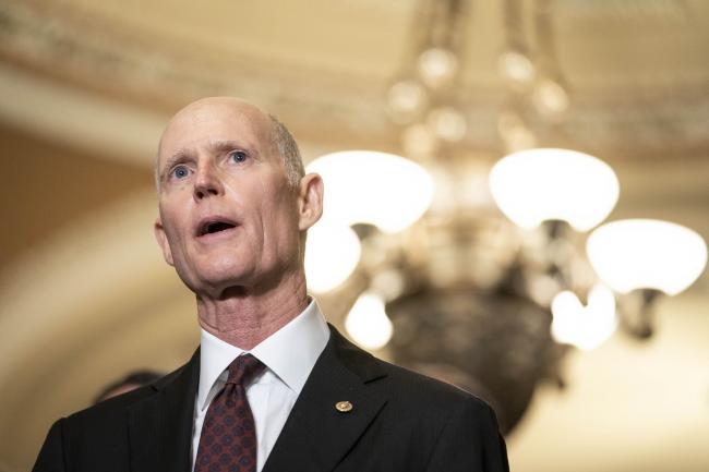 © Bloomberg. Senator Rick Scott, a Republican from Florida, speaks during a news conference following a weekly Republican caucus luncheon at the U.S. Capitol in Washington, D.C., U.S., on Tuesday, Sept. 21, 2021. House Democrats set up a Tuesday vote on a bill that would suspend the U.S. debt ceiling through December 2022 and temporarily fund the government to avert a shutdown at the end of this month.