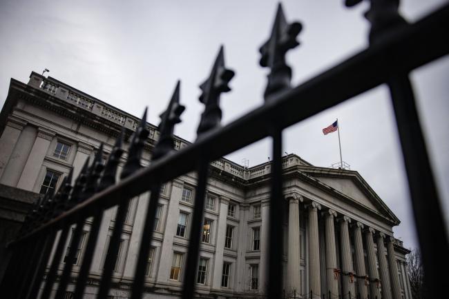 &copy Bloomberg. The U.S. Treasury building in Washington, D.C., U.S., on Sunday, Dec. 19, 2021. The Treasury's top official for financial oversight said government regulators need action from lawmakers to adequately protect investors, and the wider financial system, from risks posed by stablecoins.