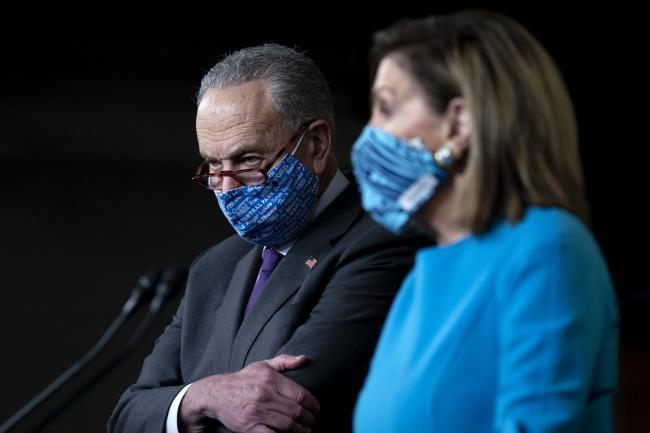 © Bloomberg. Chuck Schumer and Nancy Pelosi Photographer: Stefani Reynolds/Bloomberg