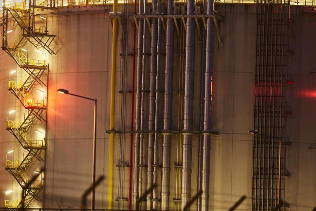 &copy Bloomberg. A staircase and pipework sit on a liquefied natural gas (LNG) cylindrical storage tank at the Gazoport terminal, operated by Polskie LNG SA, in Swinoujscie, Poland, on Thursday, July 25, 2019. More 