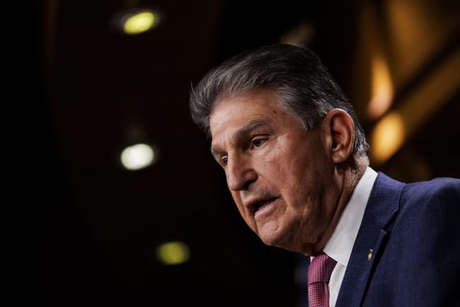 © Bloomberg. Senator Joe Manchin, a Democrat from West Virginia, speaks during a news conference at the U.S. Capitol in Washington, D.C., U.S., on Monday, Nov. 1, 2021. Manchin said Congress needs more time to assess the impact of President Biden's $1.75 trillion tax and spending package on the economy and the national debt, a severe setback to any chances of quick action on the plan.