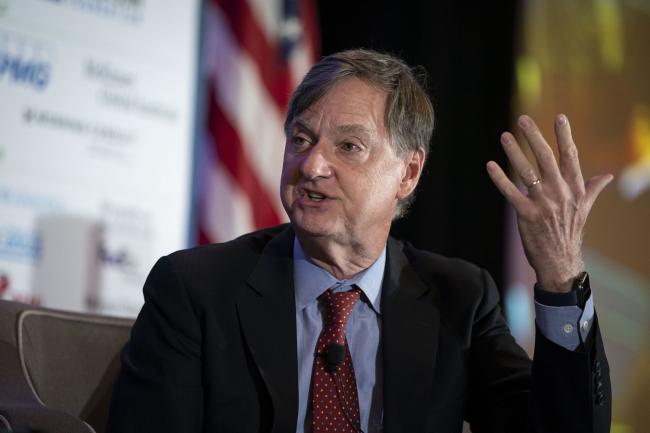 © Bloomberg. Charles Evans, president of the Federal Reserve Bank of Chicago, speaks during the National Association of Business Economics (NABE) annual meeting in Arlington, Virginia, U.S., on Monday, Sept. 27, 2021. Evans said the U.S. central bank needs to keep monetary policy easy to raise the public's inflation expectations even after the current bout of inflationary pressures from supply-chain disruptions fades.