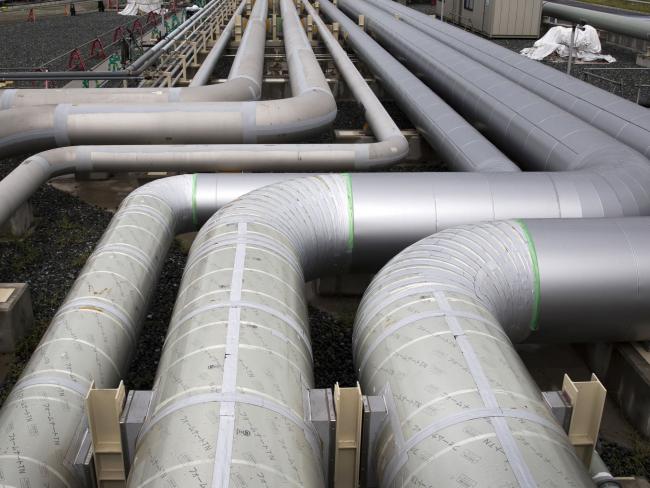 &copy Bloomberg. Gas pipes sit near a liquefied natural gas (LNG) storage tank under construction, left, at Tokyo Electric Power Co.'s (Tepco) Futtsu gas-fired thermal power plant in Futtsu, Chiba Prefecture, Japan, on Monday, Sept. 10, 2018. Japan will maintain a target for clean energy to account for as much as 24 percent of the countrys power mix by 2030, according to a long-term plan approved by the Cabinet in July.