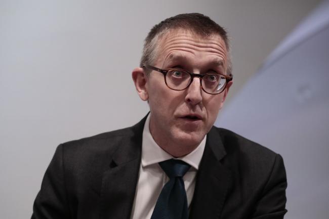 © Bloomberg. Sam Woods, deputy governor for prudential regulation at the Bank of England (BOE) and chief executive officer of the Prudential Regulation Authority (PRA), speaks during a news conference following the publication of the Financial Stability Report at the central bank in the City of London, U.K., on Monday, Dec. 16, 2019. The BOE said it will lift the amount of high-quality capital banks are required to hold, even as it said the U.K.'s biggest lenders can weather a financial crisis.