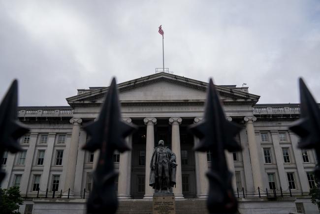 &copy Bloomberg. The U.S. Treasury Department building in Washington, D.C., U.S., on Saturday, June 26, 2021. The Federal Reserve might consider an interest-rate hike from near zero as soon as late 2022 as the labor market reaches full employment and inflation is at the central bank's goal.