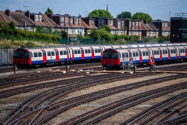 © Bloomberg. London tube trains at Northfields Train Depot in London, UK, on Tuesday, June 14, 2022. Rail and underground strikes due to hit the UK for three days later this month could cost the economy almost 100 million pounds ($125 million), with London dealt the biggest blow.