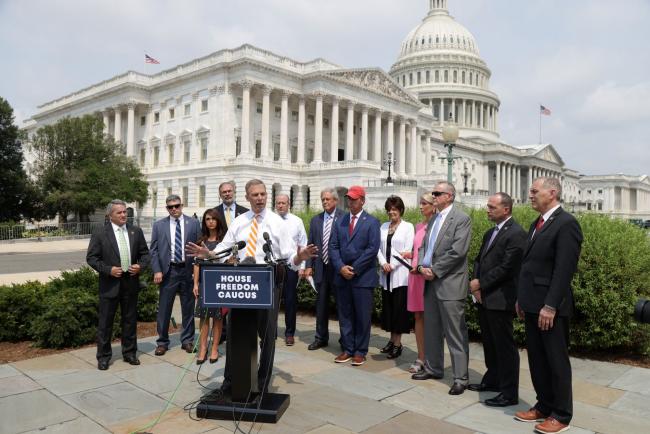 © Bloomberg. WASHINGTON, DC - JULY 29: U.S. Rep. Scott Perry (R-PA) (5th L) speaks during a news conference outside the U.S. Capitol July 29, 2021 in Washington, DC. The House Freedom Caucus held a news conference to call for Reps. Liz Cheney (R-WY) and Adam Kinzinger (R-IL) to be expelled as members of the House Republican Conference. (Photo by Alex Wong/Getty Images)