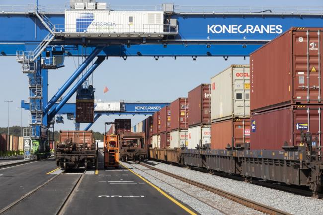 &copy Bloomberg. Freight trains carrying shipping containers stopped at the Georgia Port Authority Mason Mega Rail Terminal in Garden City, Georgia, U.S., on Friday, Nov. 12, 2021. The U.S. Department of Transportation will allow the Georgia Port Authority to build storage for shipping containers at sites near the Port of Savannah using $8 million in unspent federal grants, part of a new plan to relieve supply-chain bottlenecks at U.S. ports. Photographer: Adam Kuehl/Bloomberg
