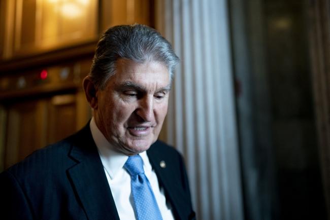© Bloomberg. Senator Joe Manchin, a Democrat from West Virginia, departs the Senate Chamber at the U.S. Capitol in Washington, D.C., U.S., on Thursday, Dec. 9, 2021. At the end of the month, the government's temporary moratorium on federal student loan payments expires, meaning loans will once again accrue interest and borrowers will be expected to resume monthly payments.