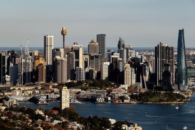 © Bloomberg. Buildings in the central business district of Sydney, Australia, on Friday, May 14, 2021. House prices have outstripped wage growth for years, leaving places like Sydney as one of the world’s most unaffordable housing markets.