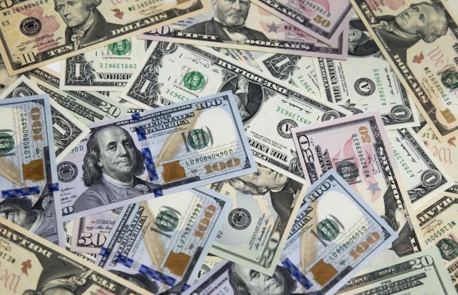 Surging Dollar Threatens $60 Billion Hit to Corporate Revenue
