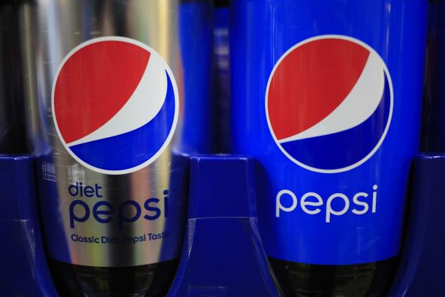 © Bloomberg. Bottles of PepsiCo Inc. brand Pepsi diet and regular soda for sale at a grocery store in Bagdad, Kentucky, U.S., on Friday, April 9, 2021. PepsiCo Inc. is scheduledto release earnings figures on April 15. Photographer: Luke Sharrett/Bloomberg