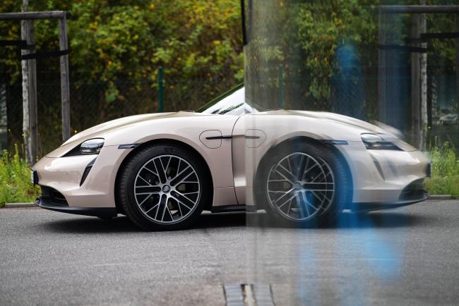 © Bloomberg. A Porsche Taycan automobile outside a Porsche SE showroom in Berlin, Germany, on Monday, Aug. 9, 2021. Porsche reports second quarter earnings on Aug. 10.