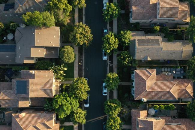 © Bloomberg. Single-family homes are seen in this aerial photograph taken over a Lennar Corp. development in San Diego, California, U.S., on Tuesday, Sept. 1, 2020. U.S. sales of previously owned homes surged by the most on record in July as lower mortgage rates continued to power a residential real estate market that’s proving a key source of strength for the economic recovery. Photographer: Bing Guan/Bloomberg