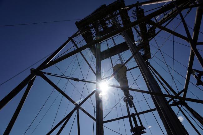 &copy Bloomberg. The oil drilling rig stands at the oil and gas field processing and drilling site operated by Ukrnafta PJSC in Boryslav, Lviv region, Ukraine, on Thursday, July 4, 2019. Ukrnafta co-owner, Naftogaz JSC, the largest gas supplier in the country of 42 million people, is seeking funds to accelerate gas purchases ahead of the heating season and a potential disruption of gas transit by Russia’s Gazprom PJSC from the start of 2020. Photographer: Vincent Mundy/Bloomberg