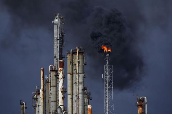 © Bloomberg. The Valero Energy Norco Refinery during a power outage caused by Hurricane Ida in LaPlace, Louisiana, U.S., on Monday, Aug. 30, 2021. Hurricane Ida barreled into the Louisiana coast on Sunday, packing winds more powerful than Hurricane Katrina and a devastating storm surge that threatens to inundate New Orleans with mass flooding, power outages and destruction. Photographer: Luke Sharrett/Bloomberg