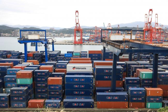 &copy Bloomberg. Shipping containers stacked at the Port of Keelung in Keelung, Taiwan, on Wednesday, Nov. 24, 2021. Taiwan, home to several major producers of leading-edge semiconductors, has been among the biggest beneficiaries of a global rebound in trade as the Covid-19 pandemic eases. Photographer: I-Hwa Cheng/Bloomberg