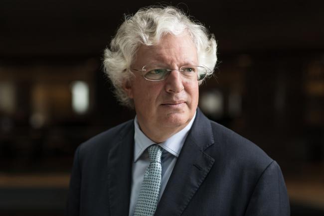 © Bloomberg. Guy Hands, chairman of Terra Firma Capital Partners, poses for a photograph following a Bloomberg Television interview in London, U.K., on Monday, April 8, 2019. Hands reflected on his failed investment in British music company EMI Music Group and also spoke about how he would run the U.K. if it was a company.