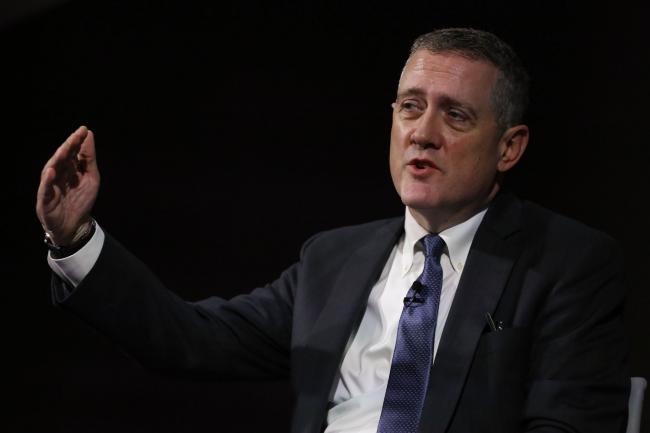 © Bloomberg. James Bullard, president and chief executive officer of the Federal Reserve Bank of St. Louis, gestures while speaking at the 2019 Monetary and Financial Policy Conference  at Bloomberg's European headquarters in London, U.K., on Tuesday, Oct. 15, 2019. Bullard said U.S. policy makers are facing too-low rates of inflation and the risk of a greater-than-expected slowdown, suggesting he’d favor an additional interest rate cut as insurance.