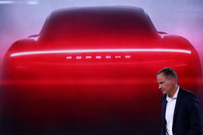 © Bloomberg. Oliver Blume unveils the new Porsche AG Taycan luxury electric automobile.