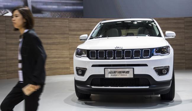 © Bloomberg. A Jeep Compass sports utility vehicle, manufactured by Guangzhou Automobile Group Co., on display at the China International Automobile Exhibition in Guangzhou, China in 2016. 