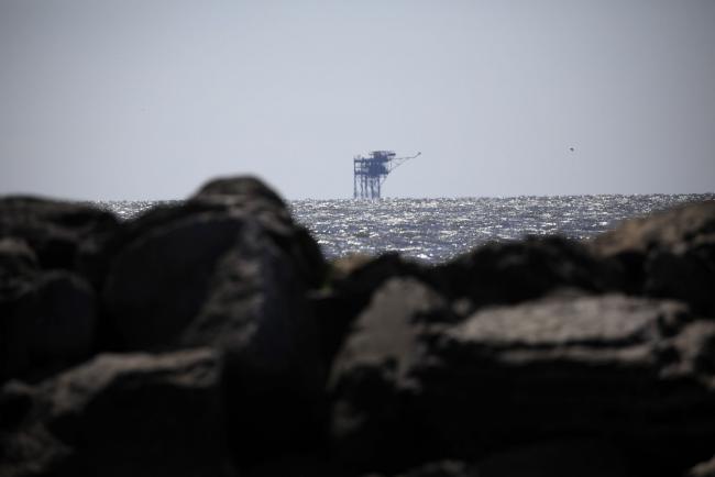 © Bloomberg. An offshore oil platform in the Gulf of Mexico. Photographer: Luke Sharrett/Bloomberg