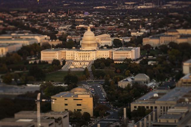 © Bloomberg. (EDITORS NOTE: Image was created using a variable planed lens.) The U.S. Capitol is seen in this aerial photograph taken with a tilt-shift lens above Washington, D.C., U.S., on Tuesday, Nov. 4, 2019. Democrats and Republicans are at odds over whether to provide new funding for Trump's signature border wall, as well as the duration of a stopgap measure. Some lawmakers proposed delaying spending decisions by a few weeks, while others advocated for a funding bill to last though February or March. Photographer: Al Drago/Bloomberg