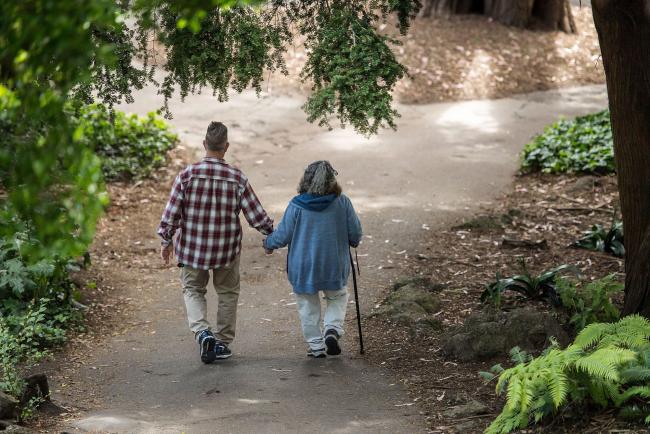 © Bloomberg. A elderly couple holds hands while walking on a path at Golden Gate Park in San Francisco, California, U.S., on Thursday, June 21, 2018. The Labor Department rule, aka the fiduciary rule conceived by the Obama administration, was meant to ensure that advisers put their clients' financial interests ahead of their own when recommending retirement investments has been killed by the Trump administration. Photographer: Bloomberg/Bloomberg