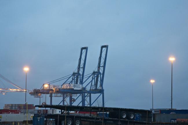 © Bloomberg. Gantry cranes stand at the Port of Baltimore in Baltimore, Maryland, U.S., on Monday, March 23, 2020. A shipping container shortage that's left everything from Thai curry to Canadian peas idling in ports may be about to get a whole lot worse as China steps up its coronavirus precautions on incoming vessels. Photographer: Andrew Harrer/Bloomberg