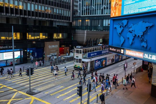 © Bloomberg. Pedestrians in the Central area of Hong Kong, China on Friday, Oct. 29, 2021. Hong Kong is scheduled to release its third-quarter gross domestic product (GDP) figures on Nov. 1.
