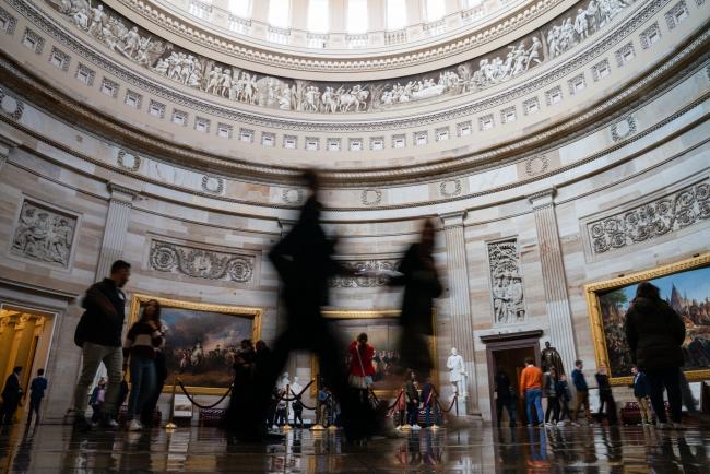 &copy Bloomberg. Visitors in the Rotunda of the U.S. Capitol in Washington, D.C., U.S., on Wednesday, March 30, 2022. Legislation to revoke Russia's regular trade status with the U.S. remains stalled as Democrats scramble to reach a deal with GOP Senators.
