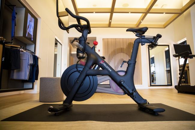 © Bloomberg. Peloton stationary bikes for sale at the company's showroom in Dedham, Massachusetts, U.S., on Wednesday, Feb. 3, 2021. Peloton Interactive Inc. is scheduled to release earnings figures on February 4.