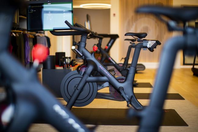 &copy Bloomberg. A Peloton stationary bike for sale at the company's showroom in Dedham, Massachusetts, U.S., on Wednesday, Feb. 3, 2021. Peloton Interactive Inc. is scheduled to release earnings figures on February 4.