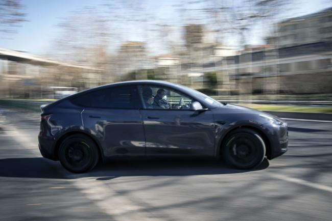 &copy Bloomberg. A Tesla Inc. Model Y electric vehicle leaves the automaker's showroom during a test drive in Shanghai, China, on Friday, Jan. 8, 2021. Teslacustomers in China wanting to get the new locally madeModelYare facing a longer wait, signaling strong initial demand for the Shanghai-built SUV.