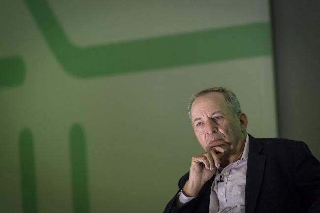 &copy Bloomberg. Larry Summers, former U.S. Treasury secretary, listens during the New Work Summit in Half Moon Bay, California, U.S., on Tuesday, Feb. 26, 2019. The event gathers powerful leaders to assess the opportunities and risks that are now emerging as artificial intelligence accelerates its transformation across industries.
