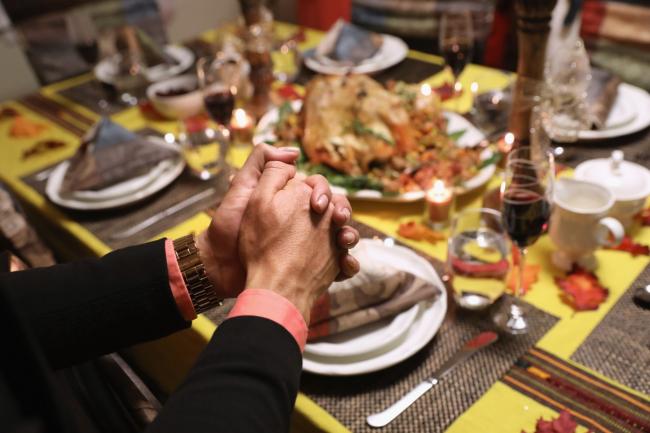 &copy Bloomberg. Plenty of people celebrate Thanksgiving with at least a handful of colleagues because friendships form at work that can be as strong as family and in some cases a proxy for it