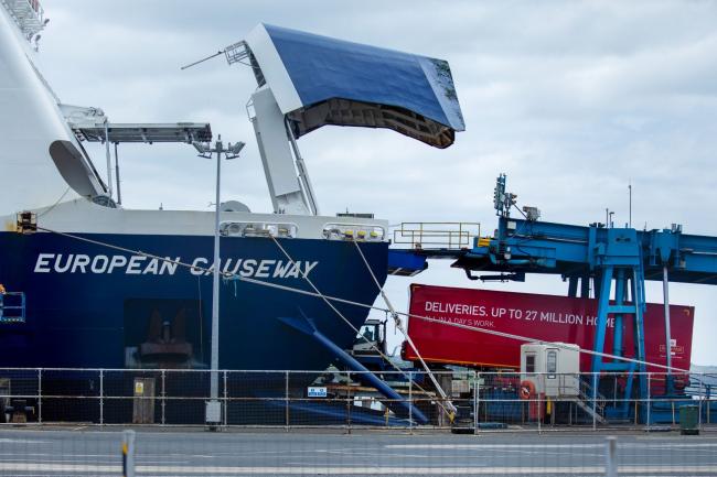 &copy Bloomberg. A Royal Mail Plc haulage truck trailer being loaded onto a ferry at Larne Port in Larne, Northern Ireland, UK, on Tuesday, July 5, 2022. British Prime Minister Boris Johnson wants Parliament to pass his plan to override the Brexit deal by the end of 2022, but it could take as long as a year to become law if the House of Lords digs in. Photographer: Emily Macinnes/Bloomberg