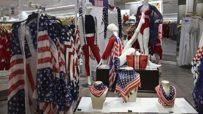 © Bloomberg. American flag themed clothing for sale inside a Shopper's Find location, a former Lord & Taylor store that went bankrupt last year, at the Willowbrook Mall in Wayne, New Jersey.