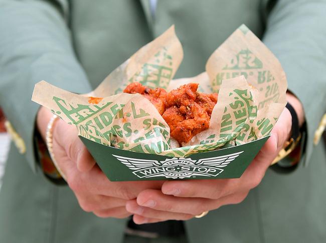 © Bloomberg. Wingstop chicken wings. Photographer: Paras Griffin/Getty Images