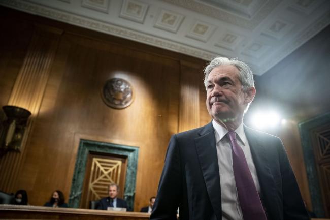 © Bloomberg. Jerome Powell, chairman of the U.S. Federal Reserve, arrives for a Senate Banking Committee hearing in Washington, D.C., U.S., on Thursday, July 15, 2021. Powell said yesterday the U.S. economic recovery still hasn't progressed enough to begin scaling back the central bank's massive monthly asset purchases. Photographer: Al Drago/Bloomberg