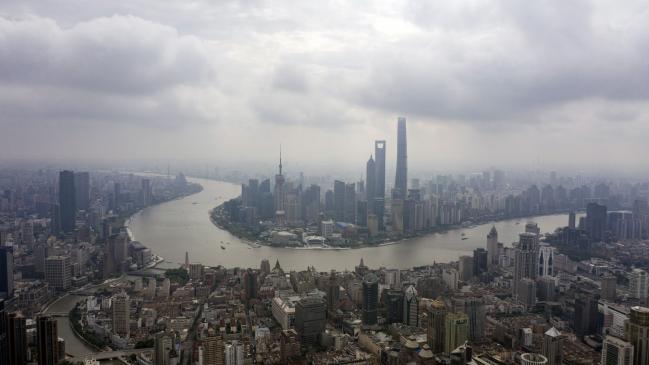 © Bloomberg. Buildings during a lockdown due to Covid-19 in Shanghai, China, on Tuesday, May 24, 2022. Shanghai has been officially easing a lockdown that kept its 25 million residents home-bound for nearly two months following a decline in Covid-19 cases, but an army of zealous grassroots volunteers who police housing compounds are still banning many people from going outside. Source: Qilai Shen/Bloomberg