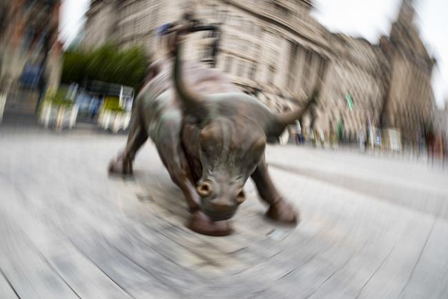 &copy Bloomberg. The Bund Bull statue in Shanghai, China, on Wednesday, Oct. 26, 2022. China’s economy slowed in October as car and real-estate sales weakened and global trade and small business confidence contracted, signaling last month’s pickup in activity wasn’t enough to change the country’s grim economic picture. Photographer: Qilai Shen/Bloomberg