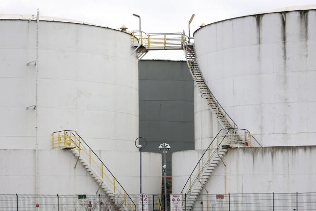 © Bloomberg. Storage tanks at the Oiltanking Deutschland tank farm in Berlin, Germany, on Friday, Feb. 4, 2022. Oiltanking GmbH Group confirmed that along with Mabanaft GmbH & Co. KG, its systems were affected by a cyberattack, but all its terminals in global markets continue to function safely, it said, without elaborating. Photographer: Krisztian Bocsi/Bloomberg