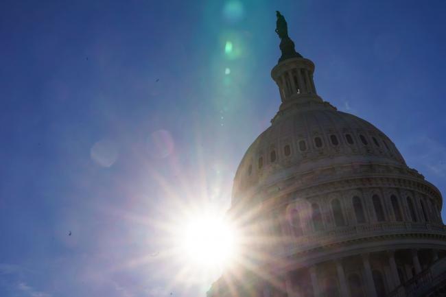 © Bloomberg. The U.S. Capitol in Washington, D.C., U.S., on Monday, Dec. 13, 2021. Lawmakers aim to vote this week to raise the debt limit enough to get past the 2022 midterm elections, and they appear to have a clear path after striking a bipartisan deal last week on a related procedural bill. Photographer: Sarah Silbiger/Bloomberg