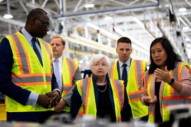 © Bloomberg. Janet Yellen, US Treasury secretary, center, listens as she learns about the Ford F-150 Lightning while touring the production line of the Ford Motor Co. Rouge Electric Vehicle Center (REVC) in Dearborn, Michigan, US, on Thursday, Sept. 8, 2022. Yellen outlined some of the Biden administration's unfinished economic business in a speech today calling for higher tax rates on the rich and on companies to help pay for social spending.